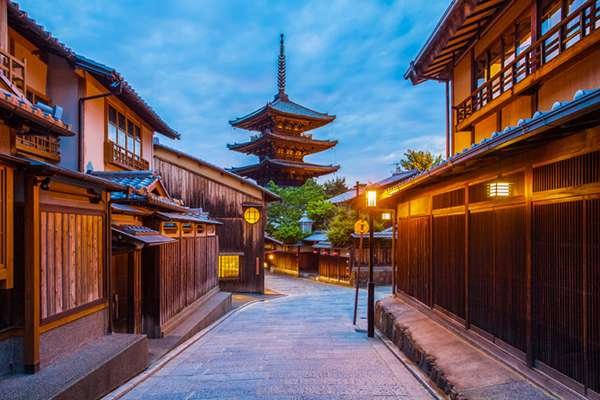 Japanese pagoda and old house in Kyoto at twilight
